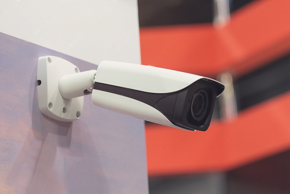 Surveillance camera is hanging on the wall